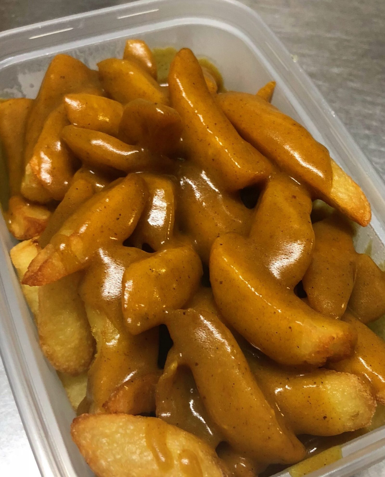 194 Curry Sauce & Chips 加汁条